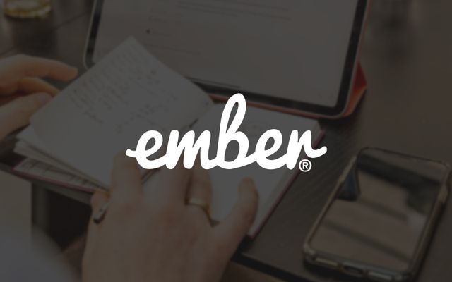 The Ember logo on a gray backround picture