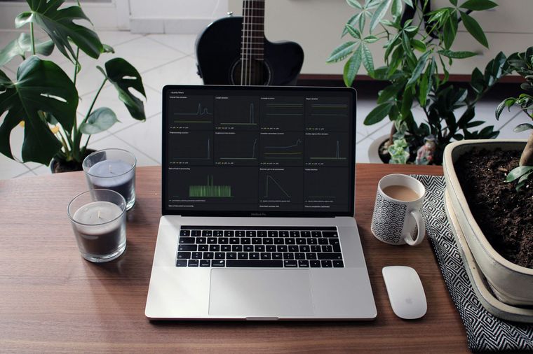 A MacBook displaying data